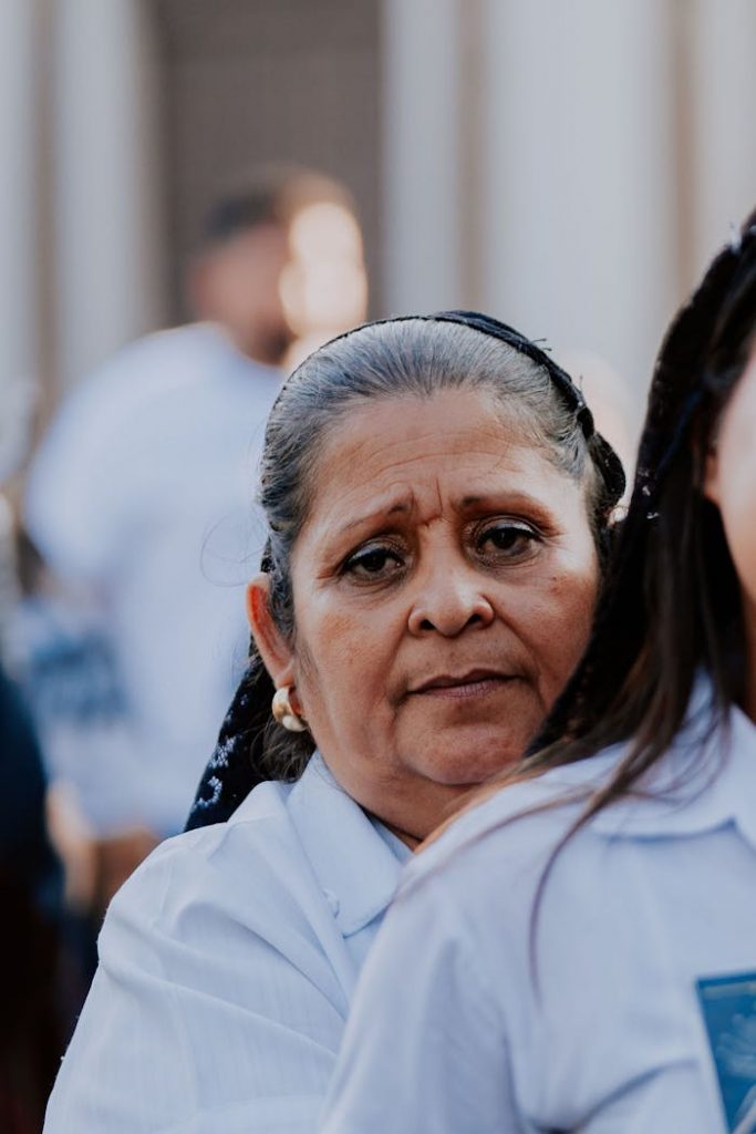 A woman in a white shirt and a woman in a white shirt